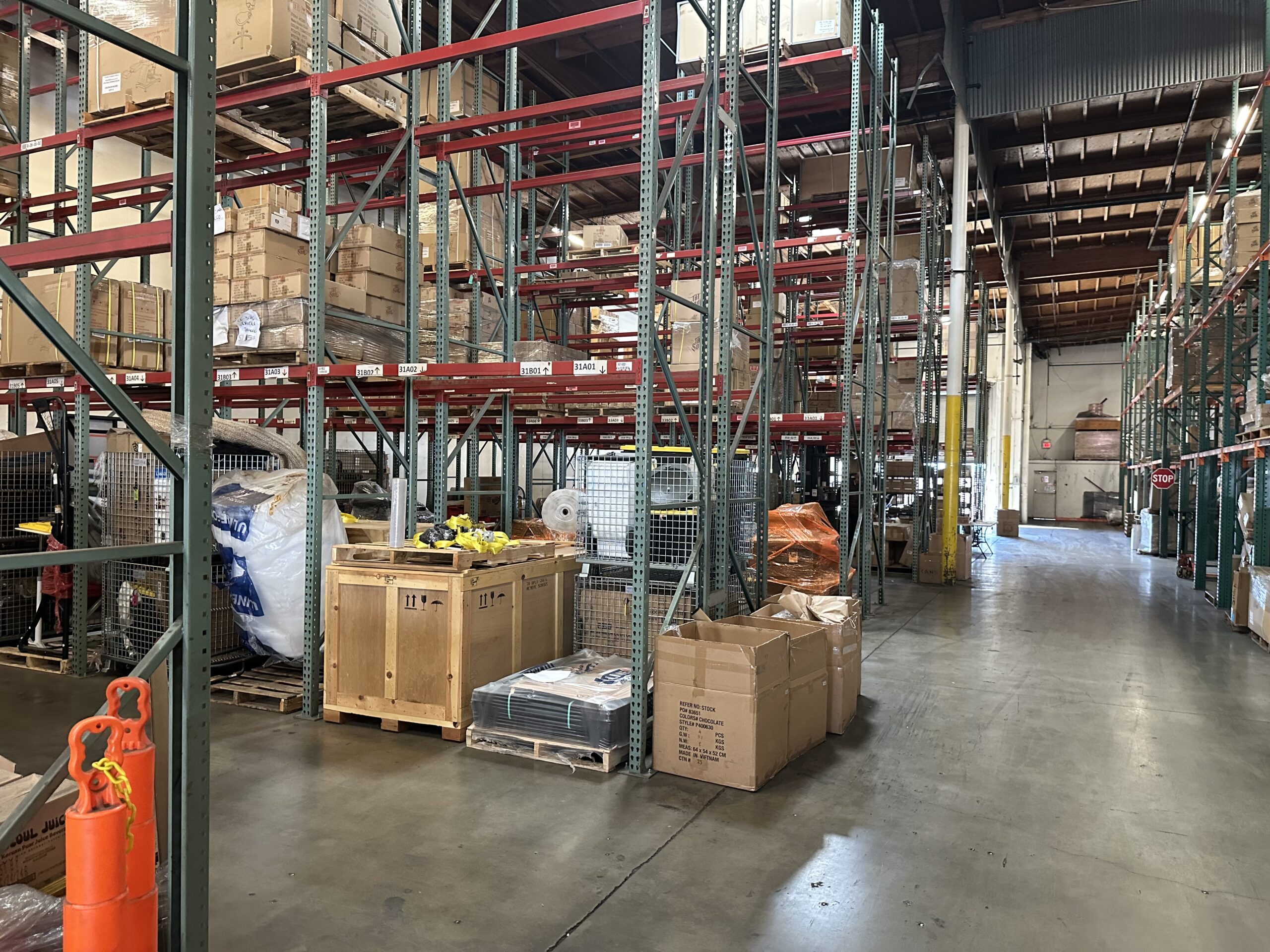 A warehouse filled with boxes and crates of food.