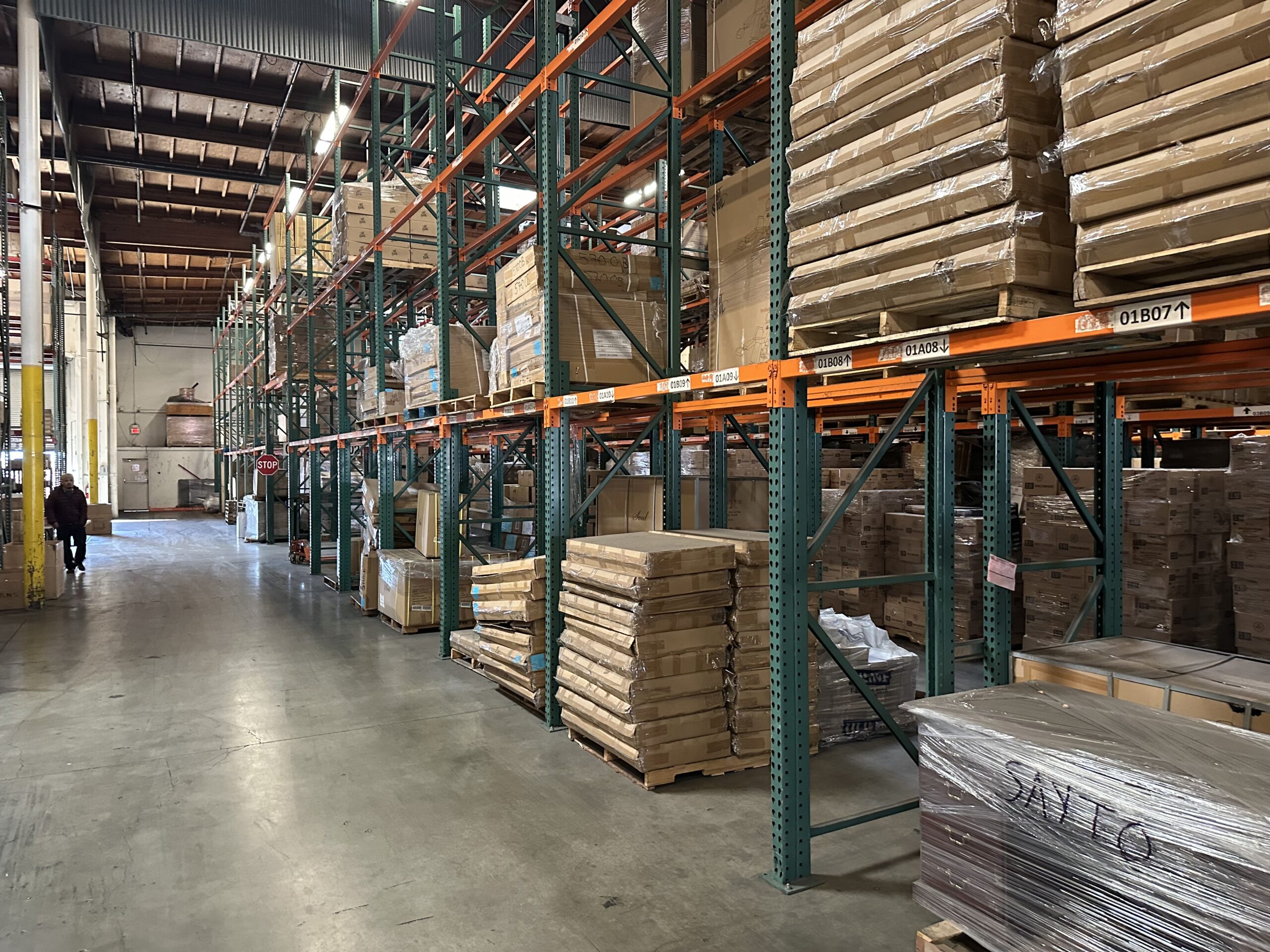 A warehouse filled with lots of shelves and racks.